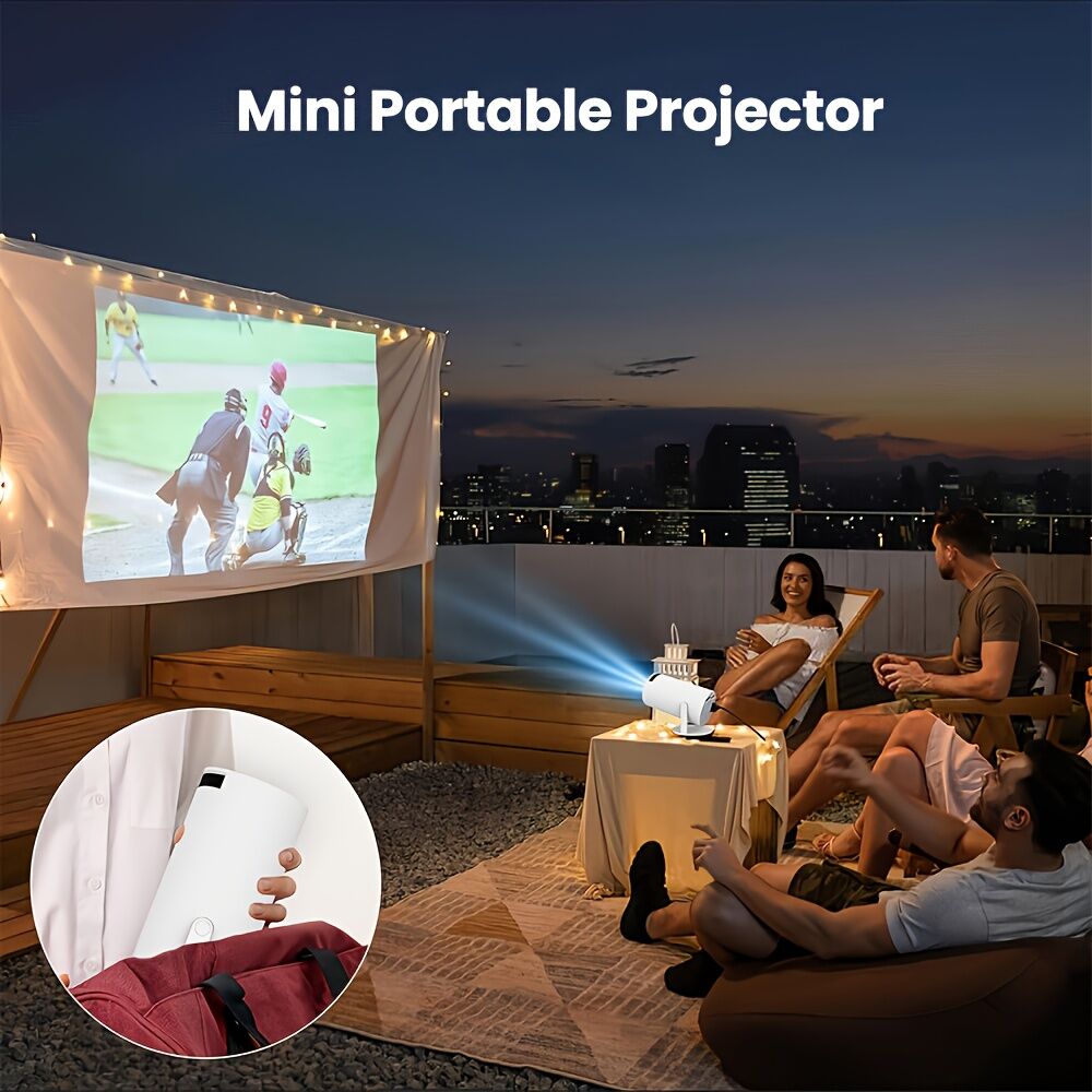 Mini portable projector being used to project a sports game onto a screen in an outdoor setting.