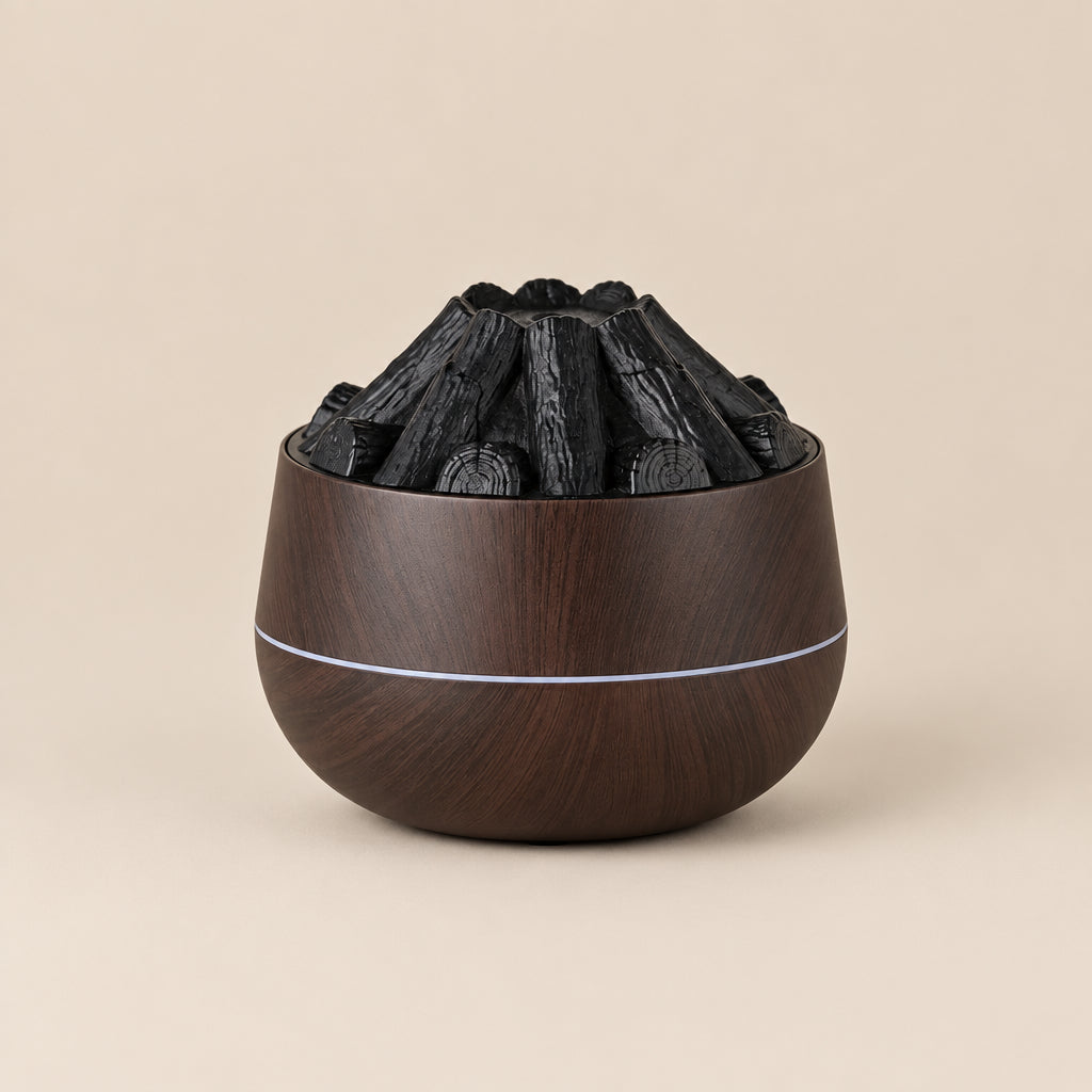Wooden fire pit with black logs on a white background