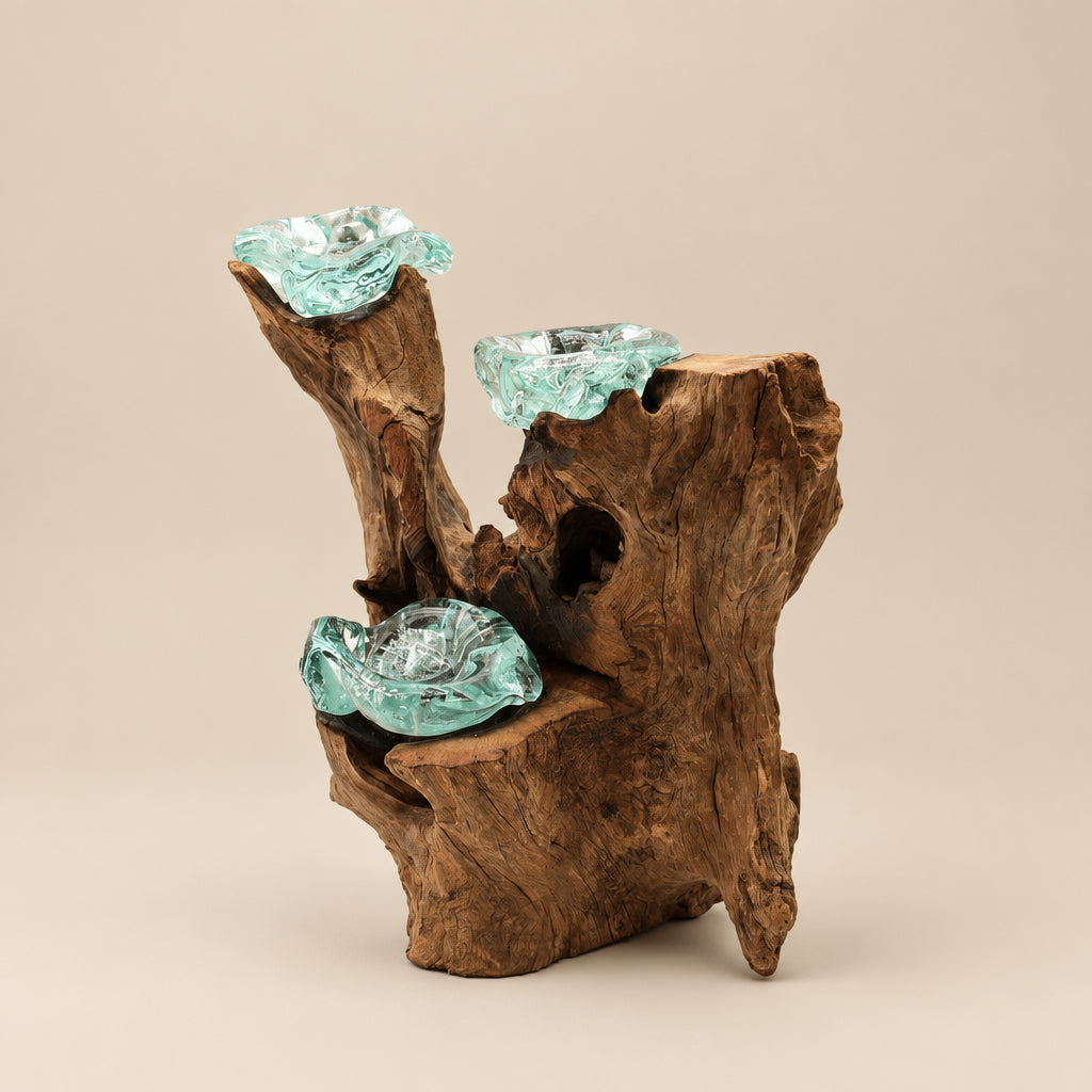 Wooden fountain with glass bowls on a white background
